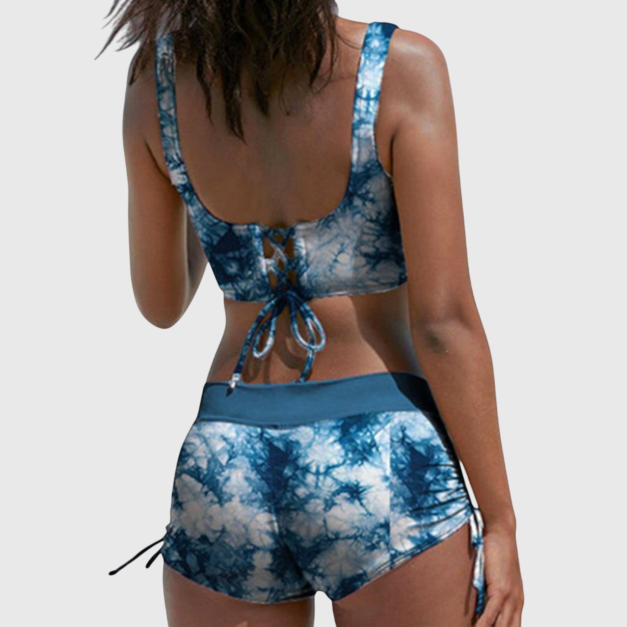 Bikini swimsuit set featuring a trendy camouflage pattern, designed as a sporty two-piece swimwear for women, perfect for beach and pool activities. 3