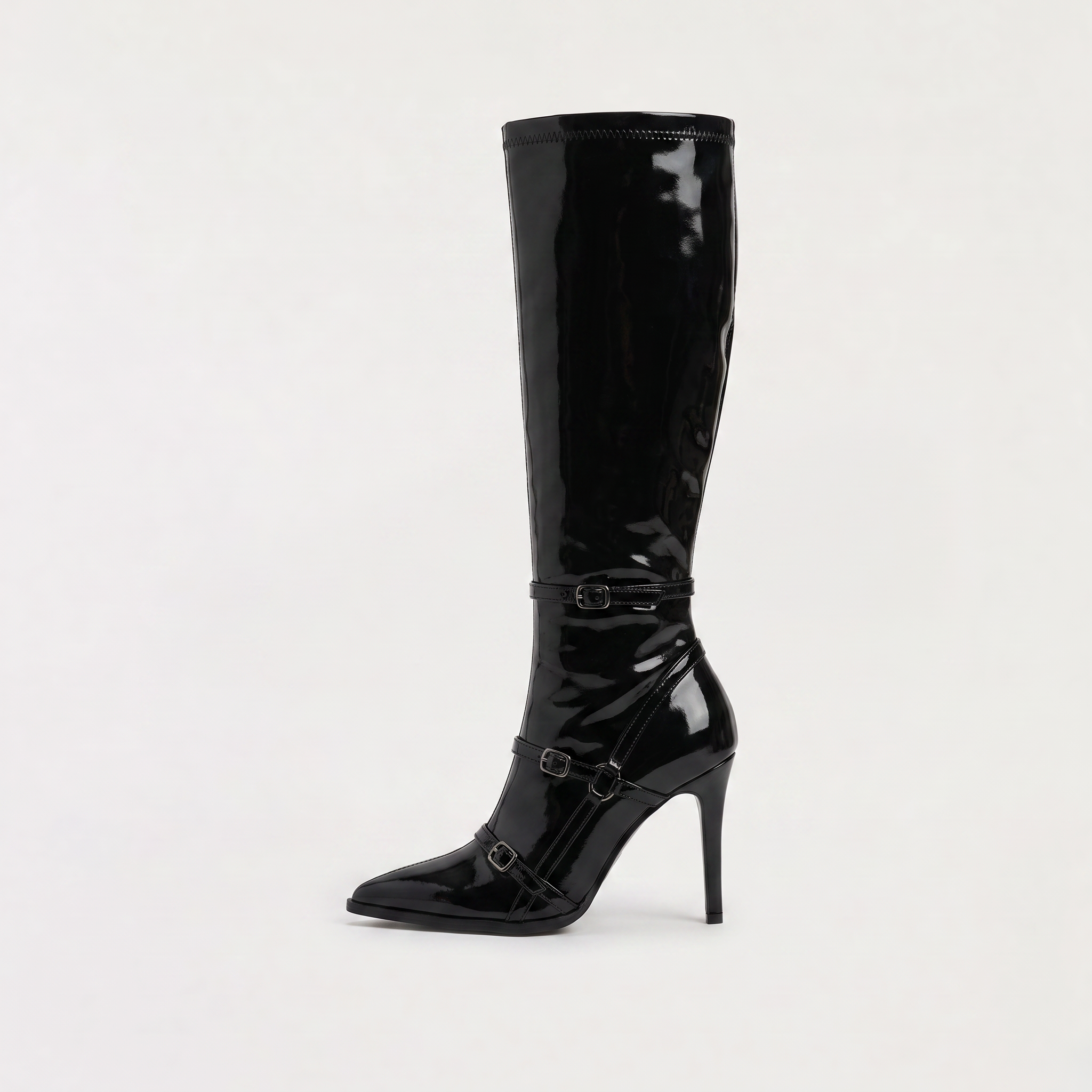 Black knee high boots featuring a sleek patent finish, inner zip closure, and stylish buckled straps, designed with elegant stiletto heels for women. 0