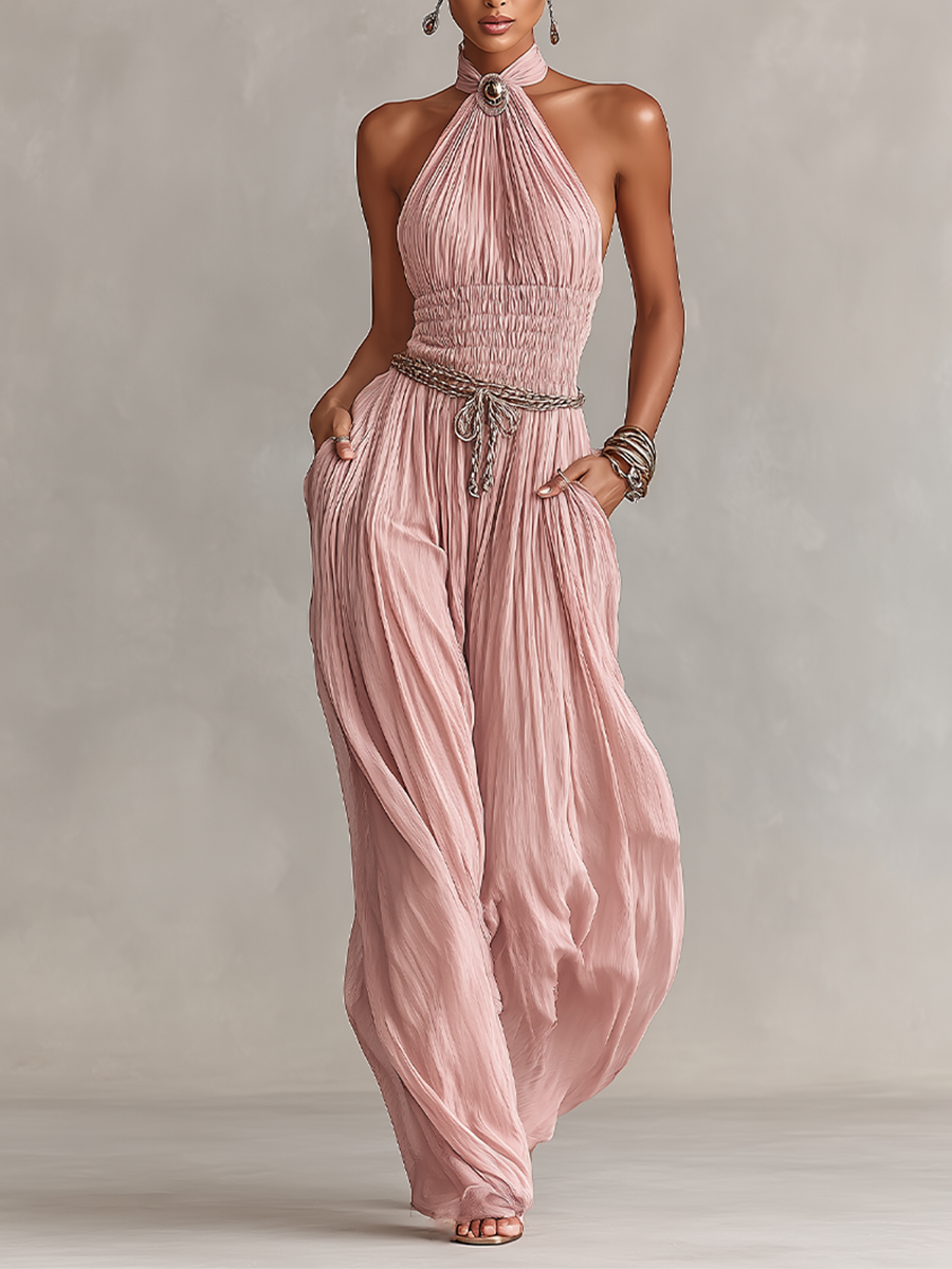 Blush jumpsuit featuring a ruched waist and wide-leg design, showcasing an elegant halter neck style perfect for formal occasions. 0