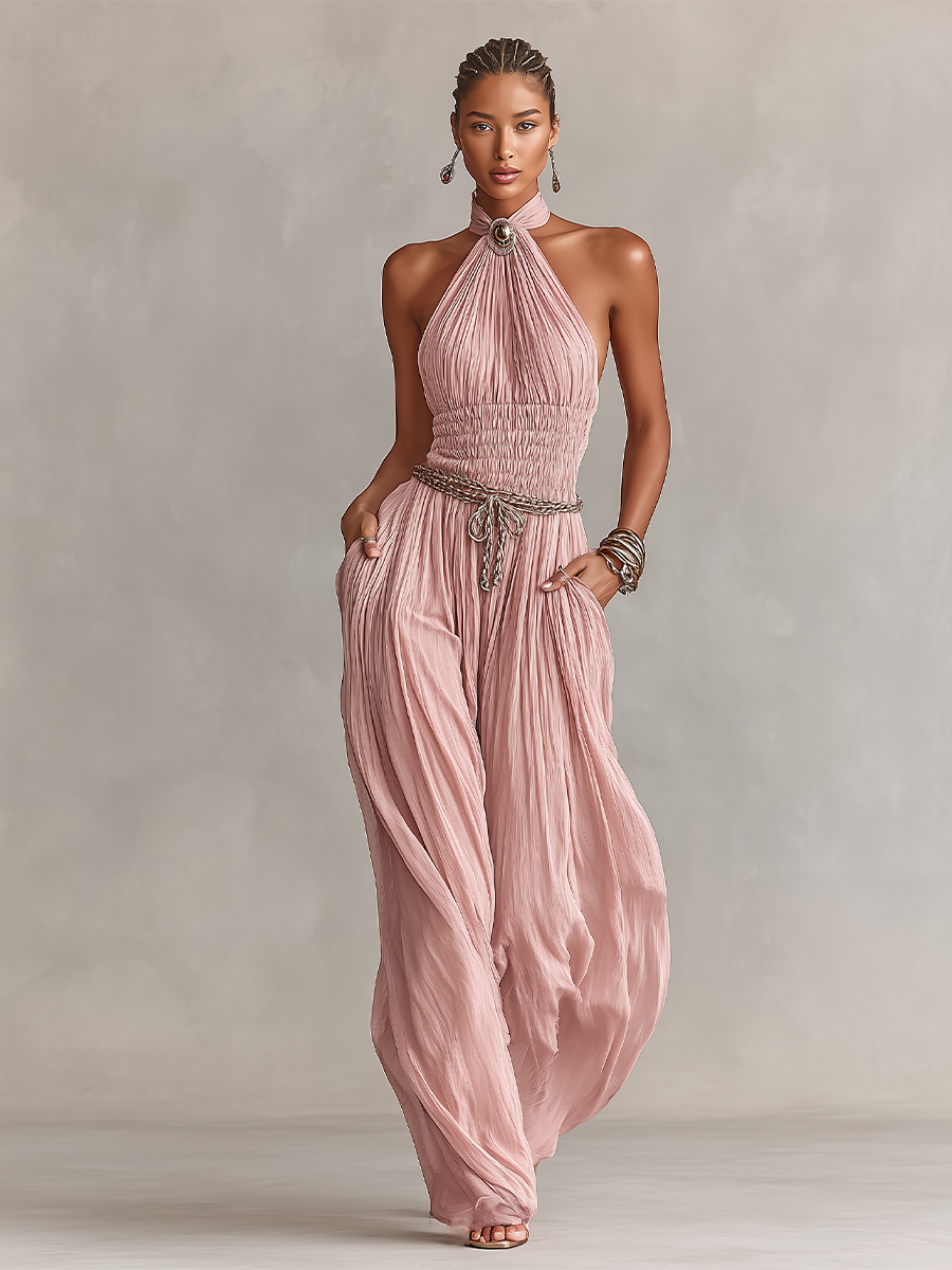 Blush jumpsuit featuring a ruched waist and wide-leg design, showcasing an elegant halter neck style perfect for formal occasions. 1