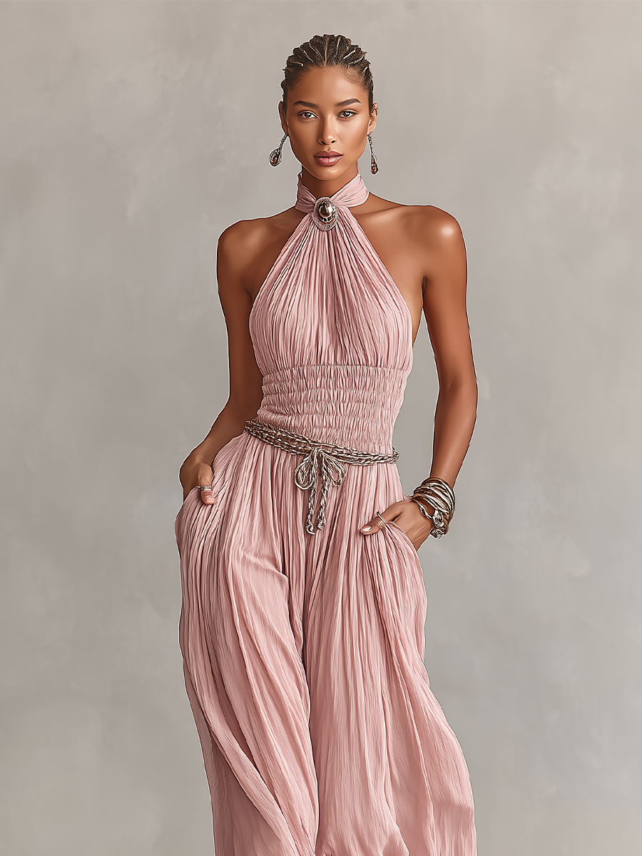 Blush jumpsuit featuring a ruched waist and wide-leg design, showcasing an elegant halter neck style perfect for formal occasions. 2