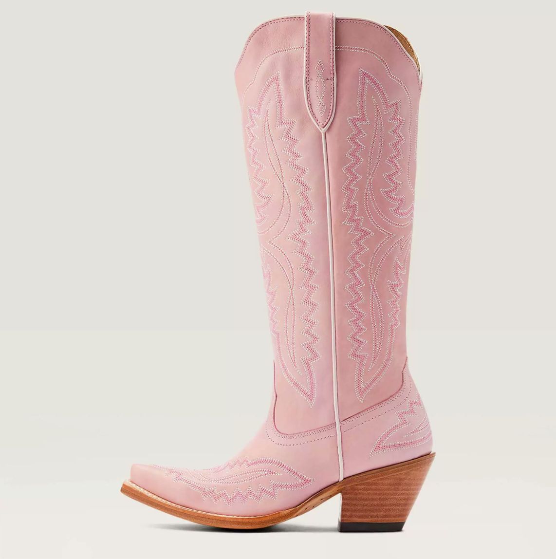 Blush Western boot featuring a sculpted heart design and stylish metal accents, perfect for adding a unique touch to any outfit. 0