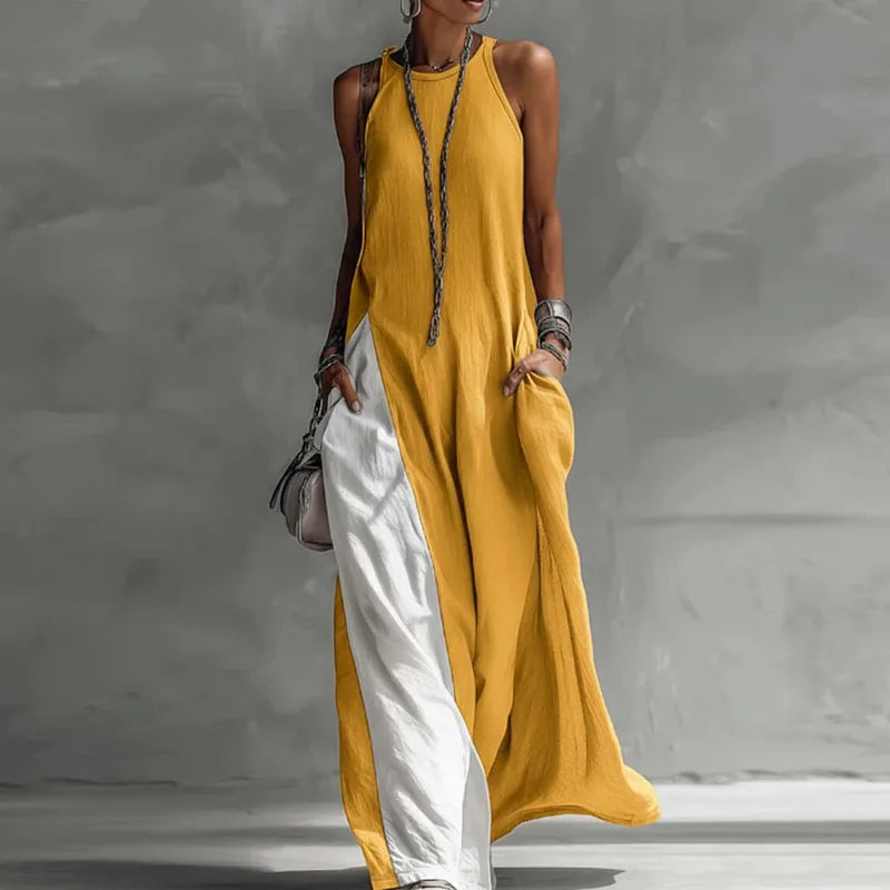 Boho maxi dress for women featuring a sleeveless A-line design, made from lightweight fabric, and designed with convenient pockets for summer outings. 0