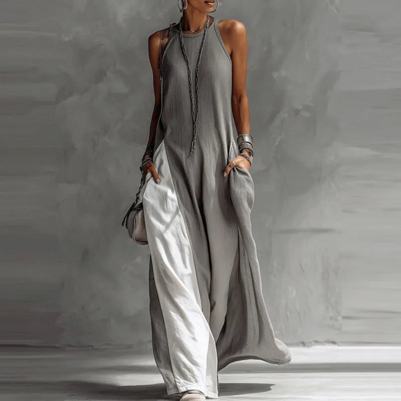 Boho maxi dress for women featuring a sleeveless A-line design, made from lightweight fabric, and designed with convenient pockets for summer outings. 1