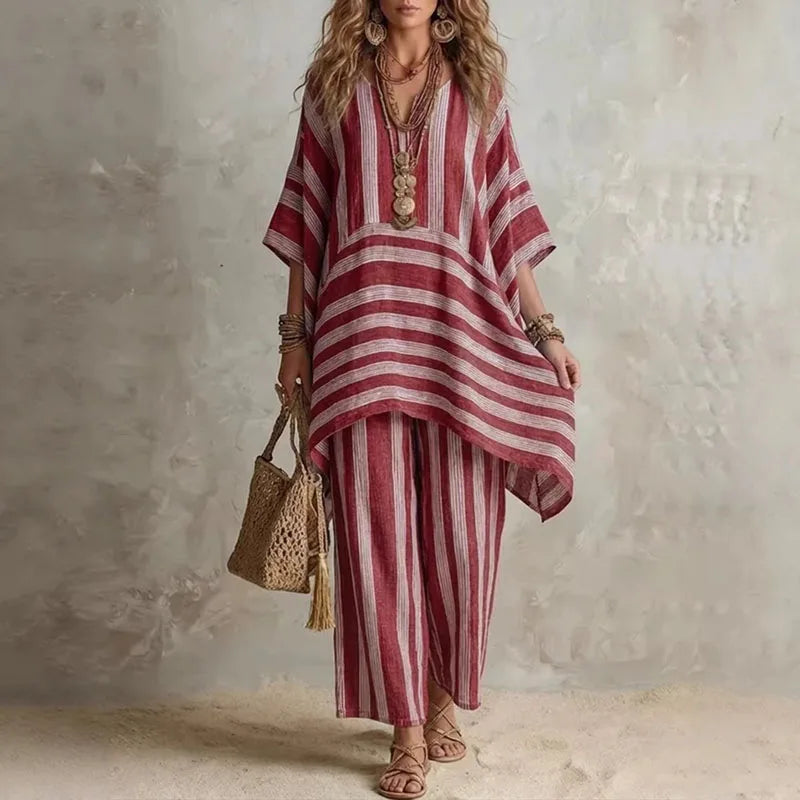 Boho vintage women's outfit featuring a stylish V-neck top and wide leg pants with a chic striped design, perfect for summer holidays. 0
