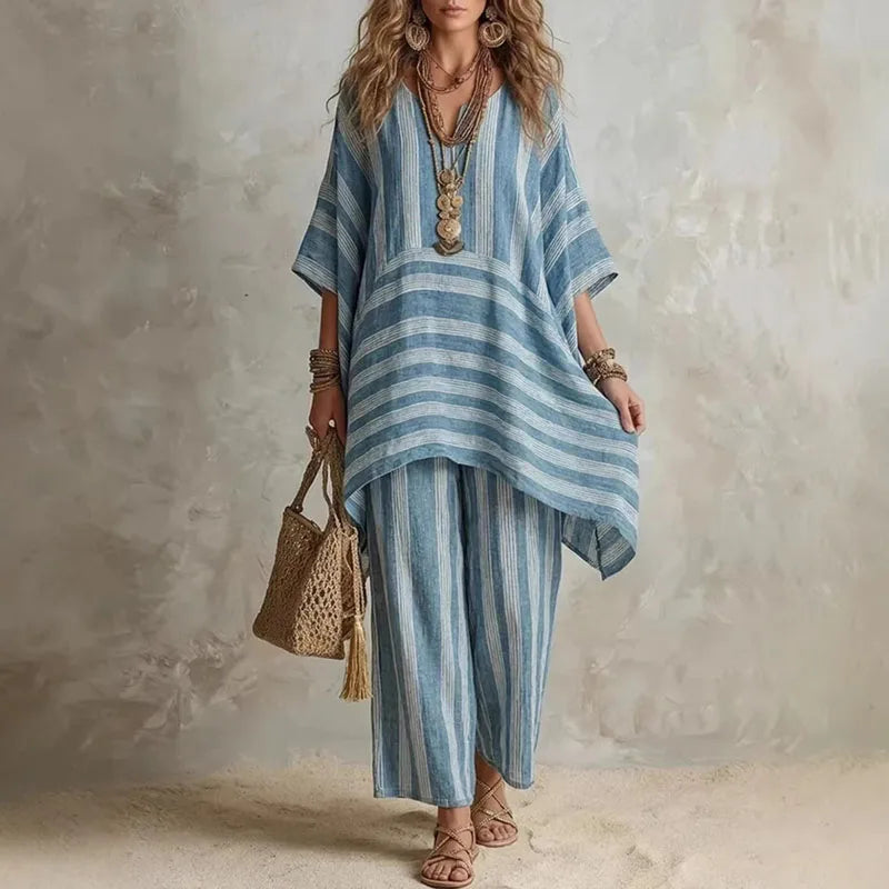 Boho vintage women's outfit featuring a stylish V-neck top and wide leg pants with a chic striped design, perfect for summer holidays. 1