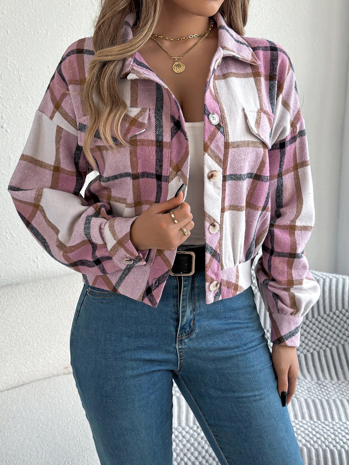 Cropped plaid shacket for women featuring a button front and chest pockets, made from soft flannel for a casual layered look. 2