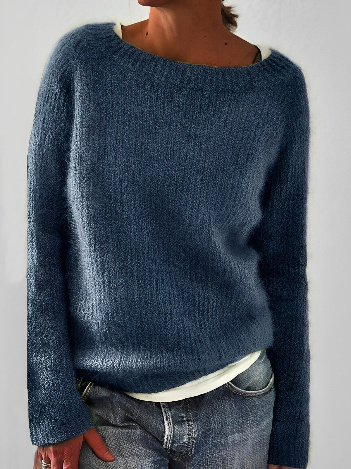 Fluffy knit sweater for women featuring a wide round neckline and slim fit, crafted from a soft brushed texture for ultimate comfort and style. 1