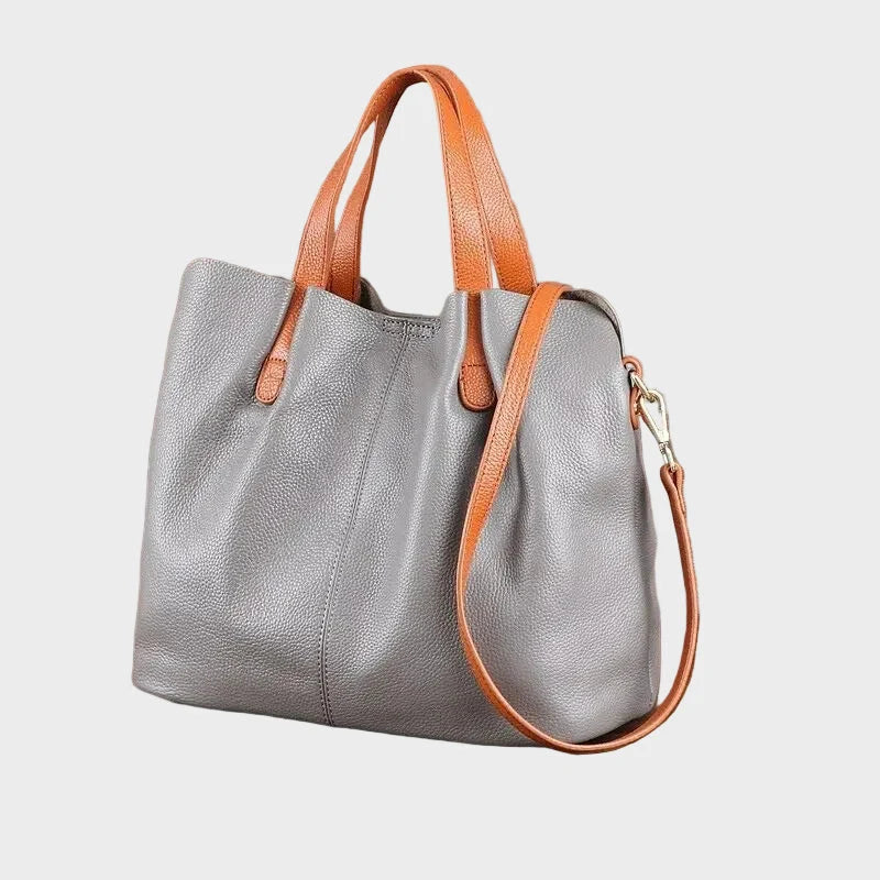 Genuine leather handbag with adjustable strap, featuring luxurious lychee grain cowhide, available in blue, black, pink, gray, and beige, designed 6