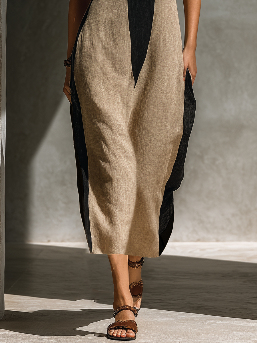 Halter neck midi dress featuring a keyhole cutout in a black and beige cotton blend, designed for an elegant fitted silhouette. 3