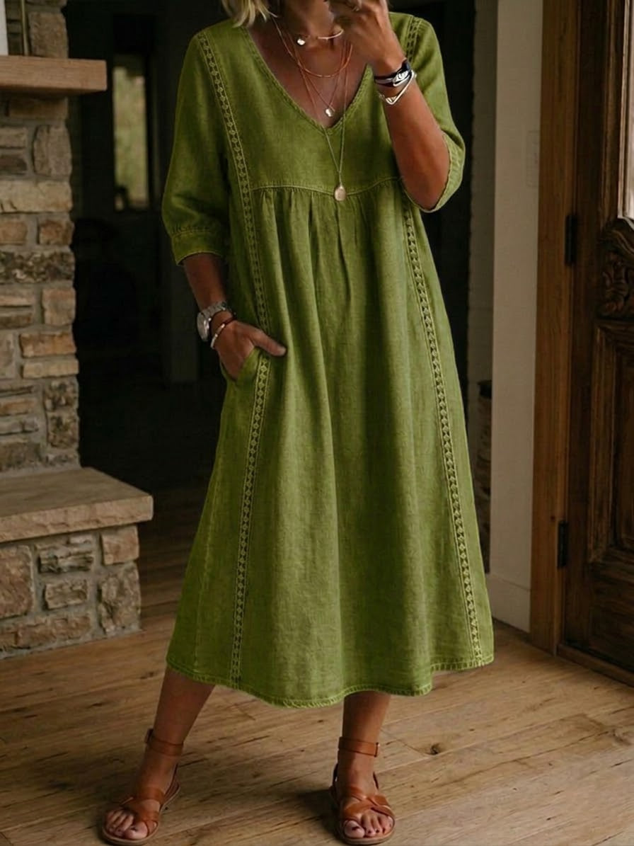 Linen midi dress featuring a V-neck and delicate lace trim, designed in a relaxed A-line silhouette, perfect for summer wear for women. 6
