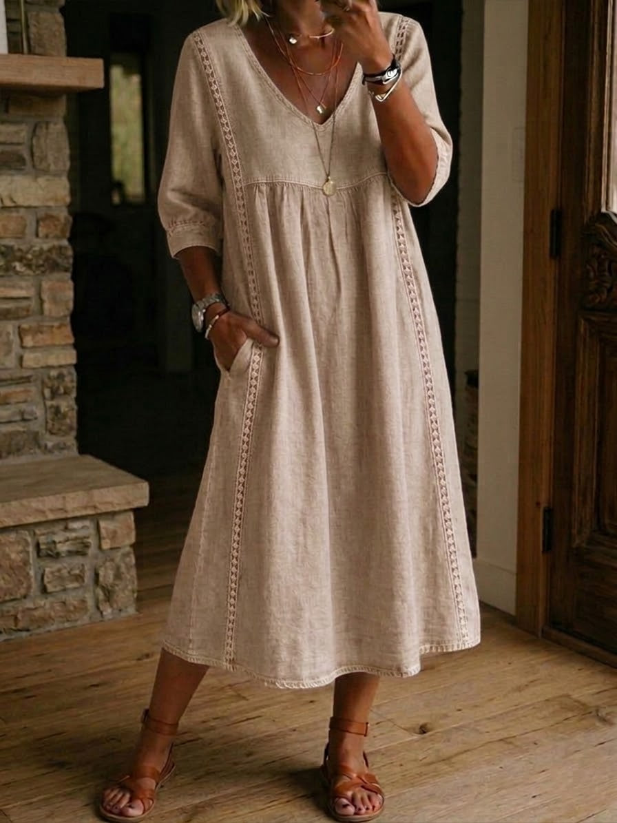 Linen midi dress featuring a V-neck and delicate lace trim, designed in a relaxed A-line silhouette, perfect for summer wear for women. 7