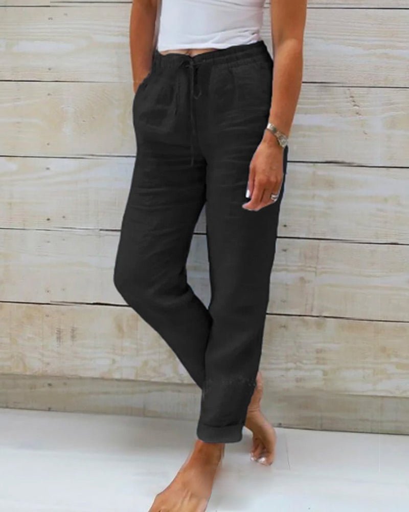 Linen trousers with drawstring waist and straight leg, featuring a relaxed fit and cropped design, perfect for women's summer fashion in white. 3