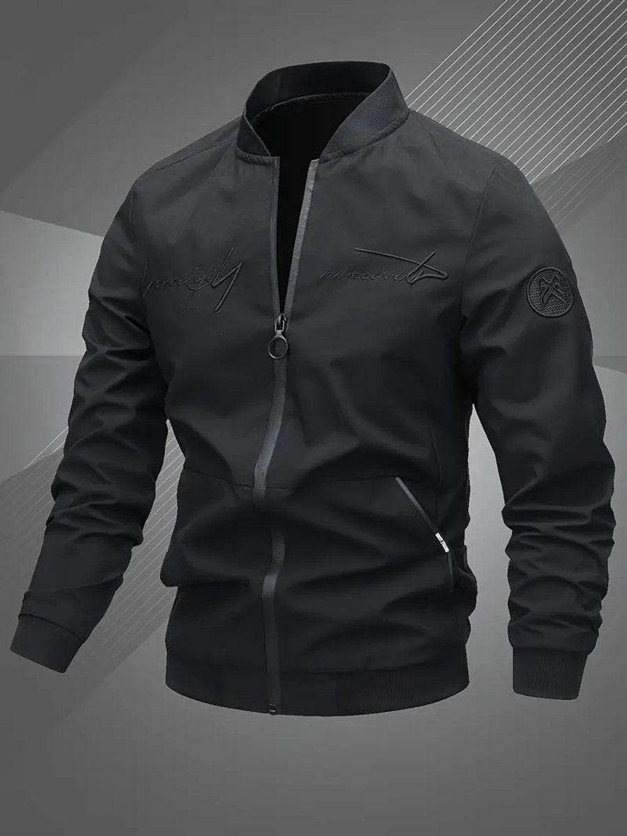 Men's black polyester bomber jacket featuring a zip-up front, baseball collar, and stylish embroidered detail. 2