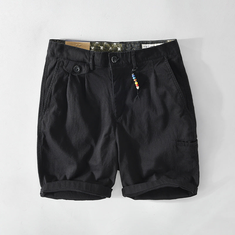 Men's cargo shorts featuring spacious pockets, made from lightweight breathable cotton, perfect for summer casual wear. 2