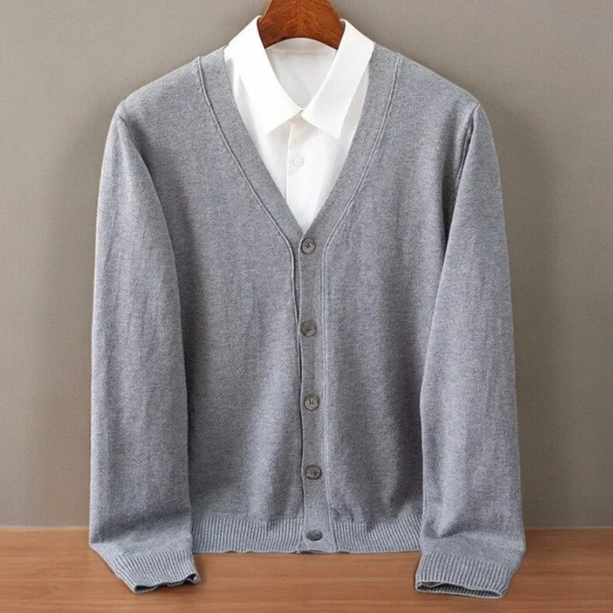 Men's cashmere cardigan in soft black featuring a button-up front and elegant V-neck design, perfect for stylish layering and comfort. 5