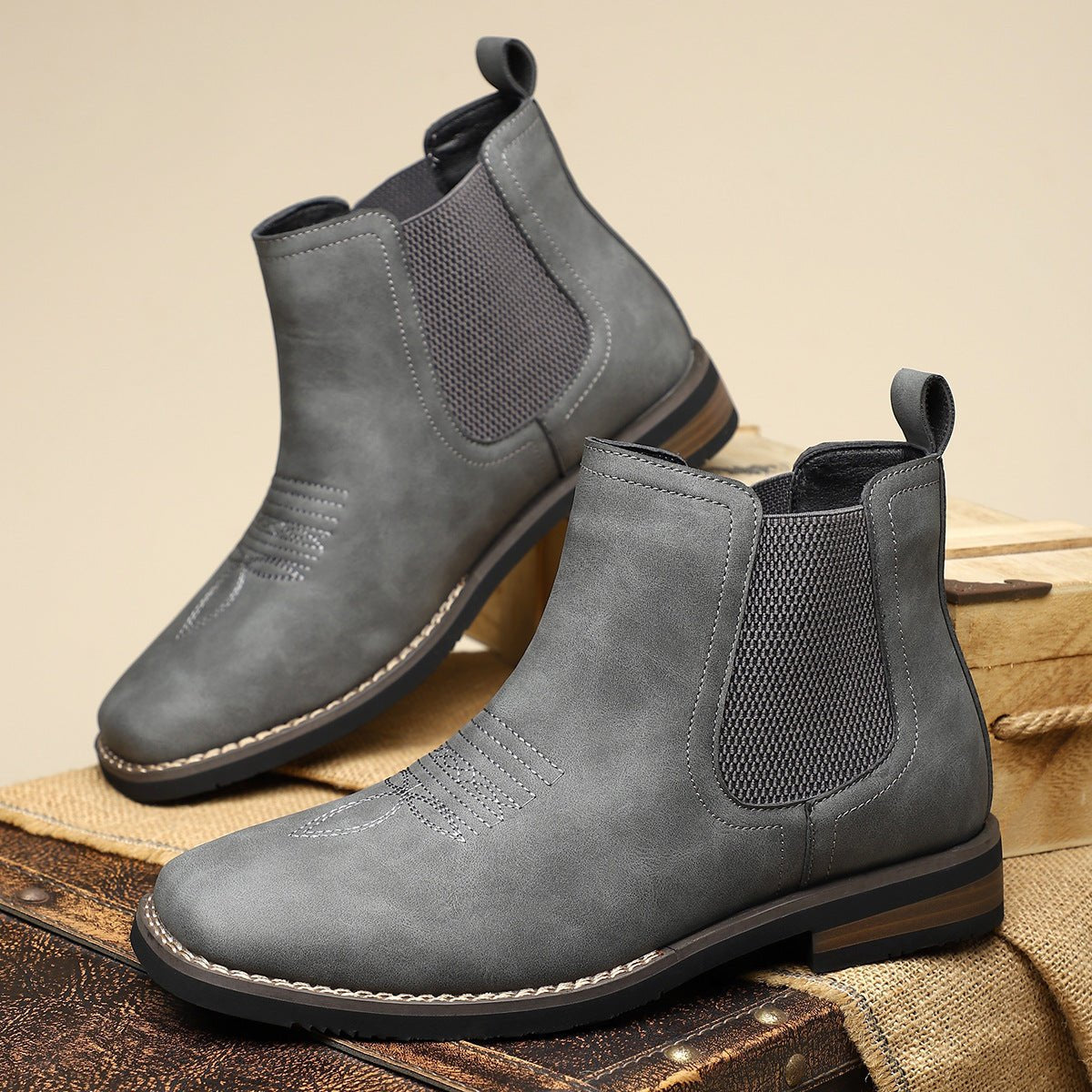 Men's tan faux leather Chelsea boots featuring elastic side panels and western stitching, perfect for stylish casual wear. 6