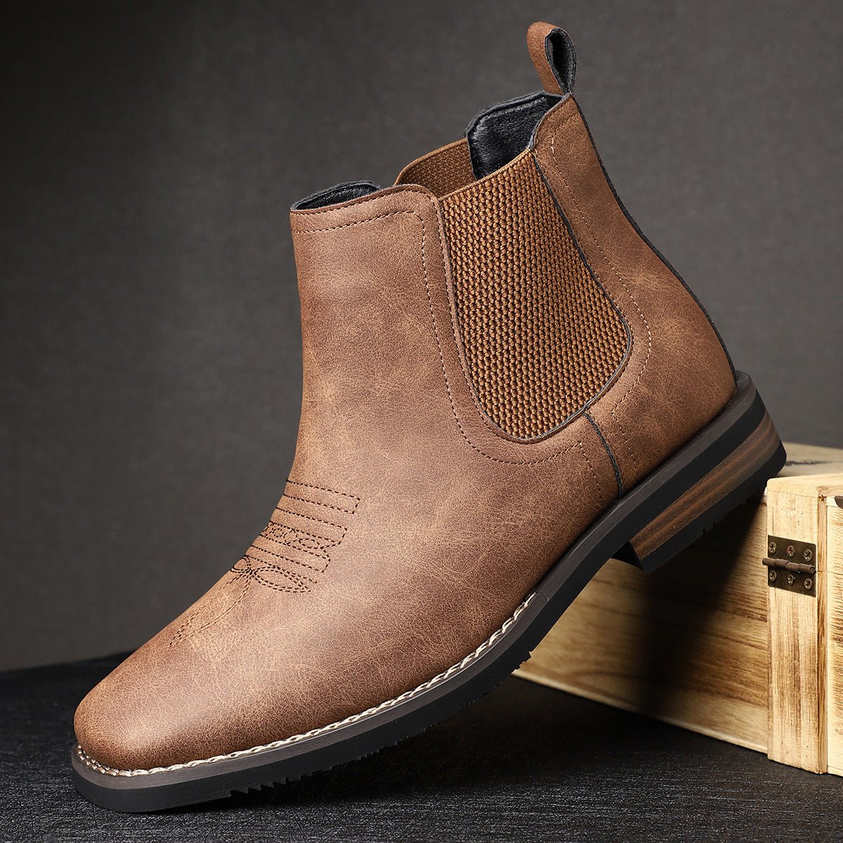 Men's tan faux leather Chelsea boots featuring elastic side panels and western stitching, perfect for stylish casual wear. 7