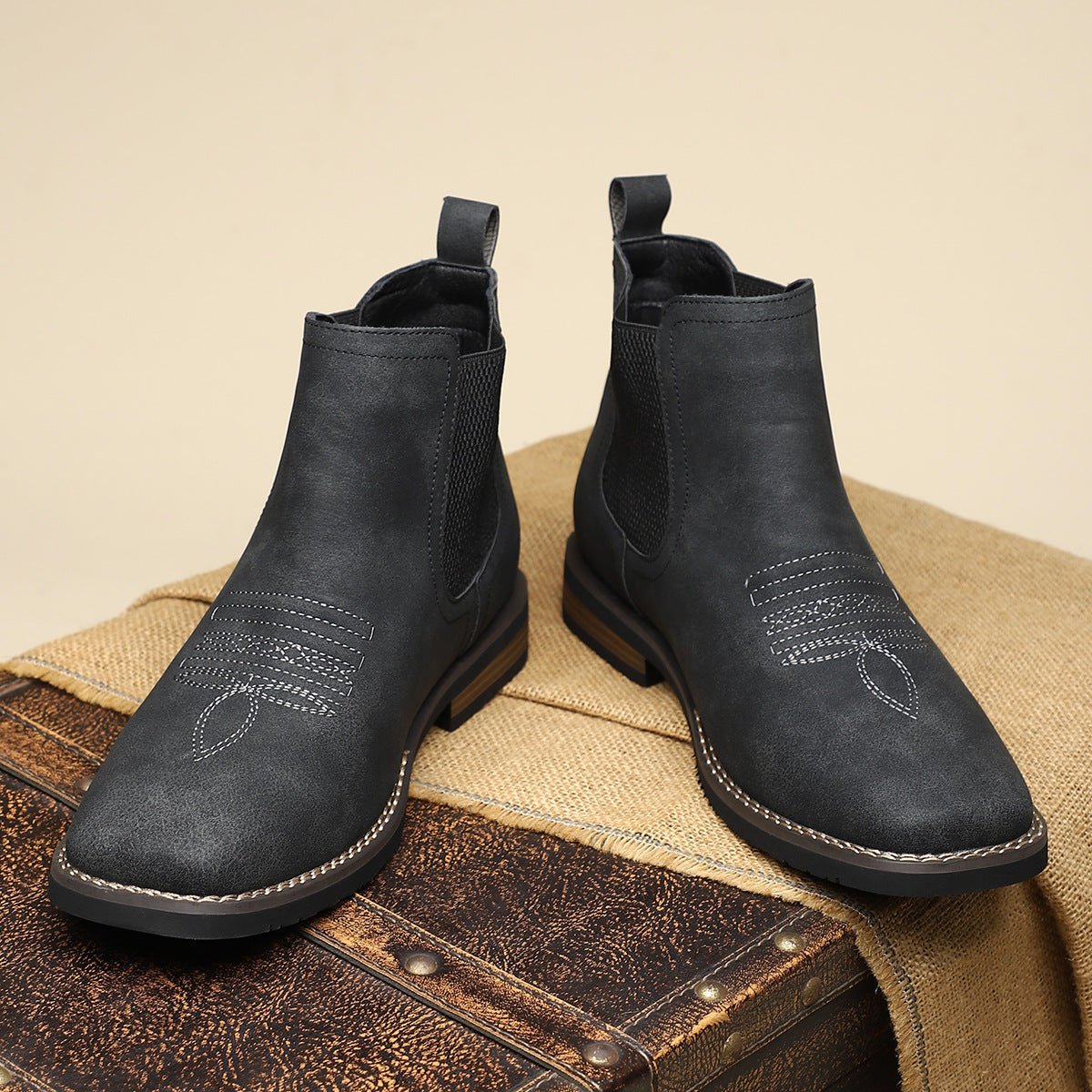Men's tan faux leather Chelsea boots featuring elastic side panels and western stitching, perfect for stylish casual wear. 9