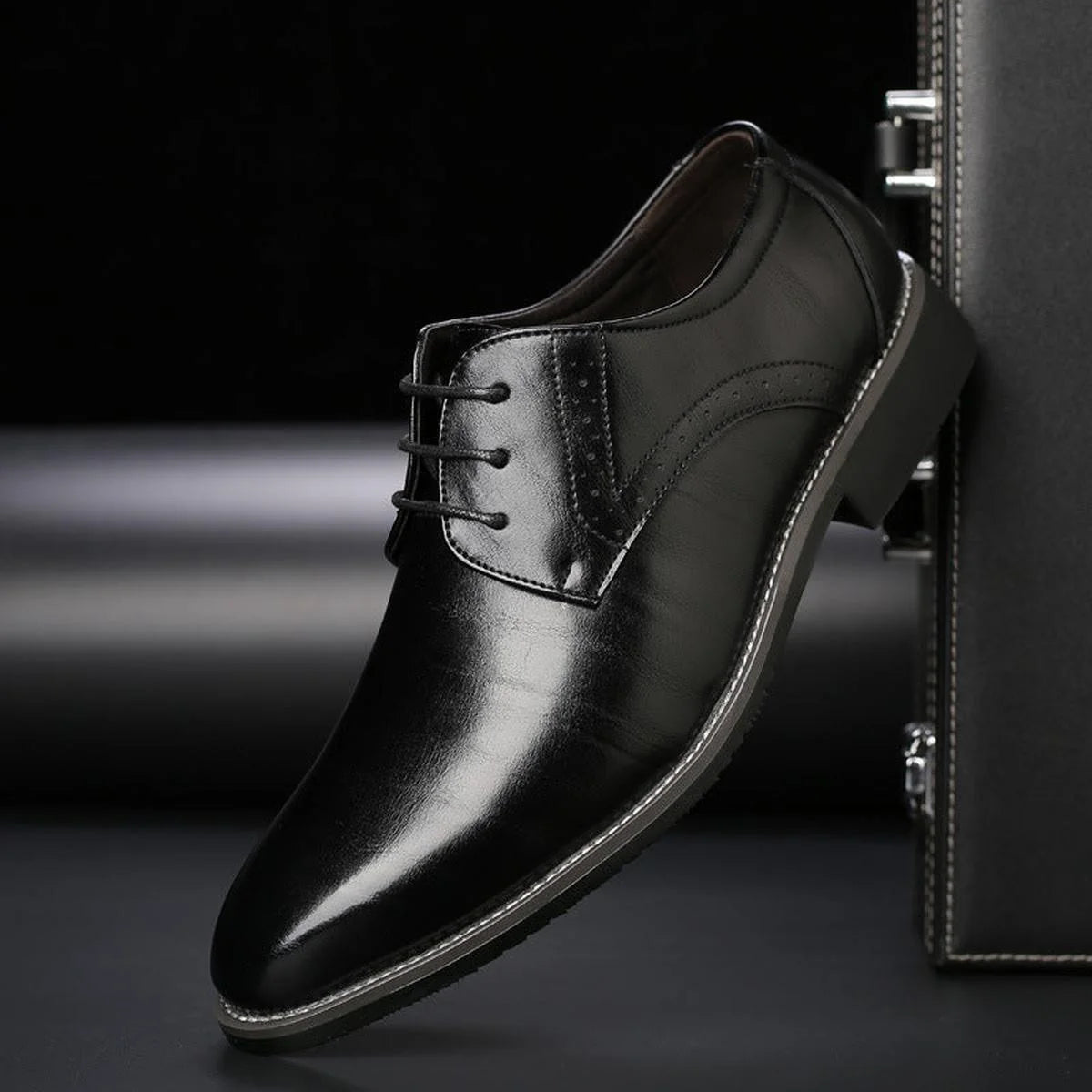 Men's black lace-up dress shoes featuring a comfortable fit and timeless design, perfect for formal occasions and professional settings. 0