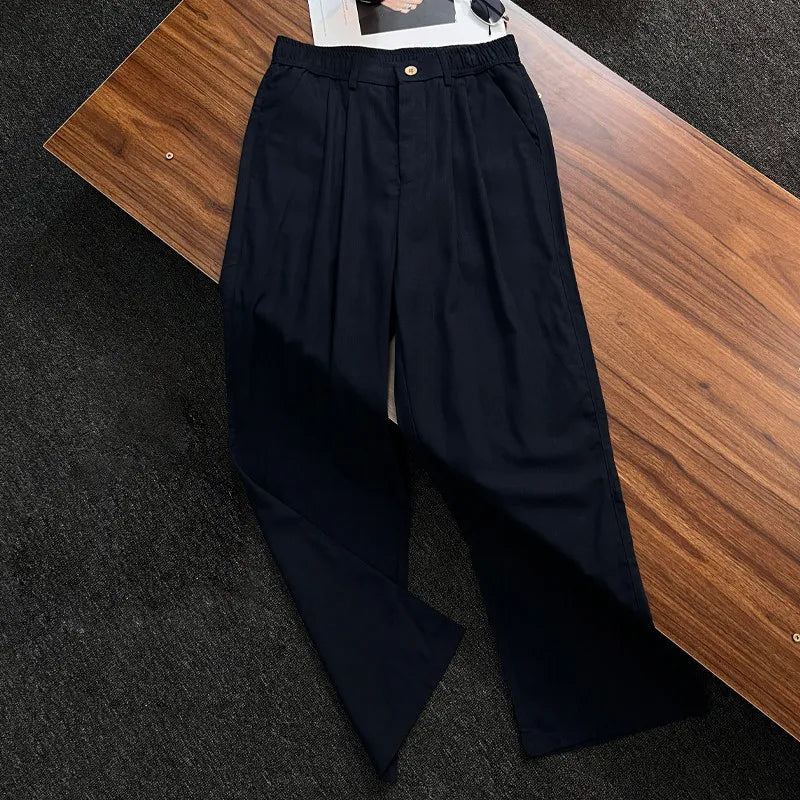 Men's linen trousers with a relaxed fit, perfect for summer; breathable fabric ideal for casual and work wear, featuring a comfortable style and versatile design. 4