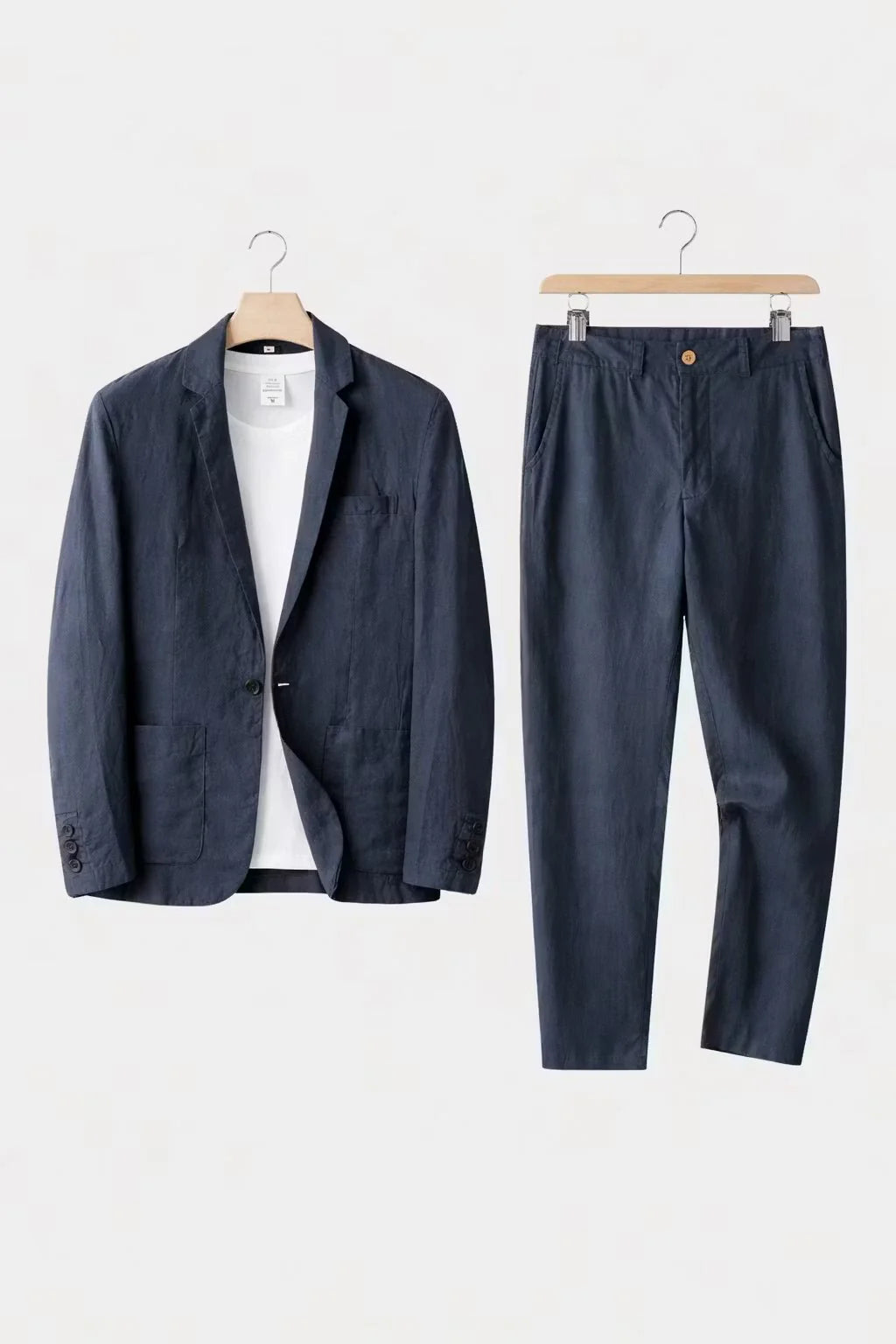 Men's suit set featuring a relaxed fit blazer and trousers made from breathable linen fabric, perfect for versatile formal and casual occasions. 7