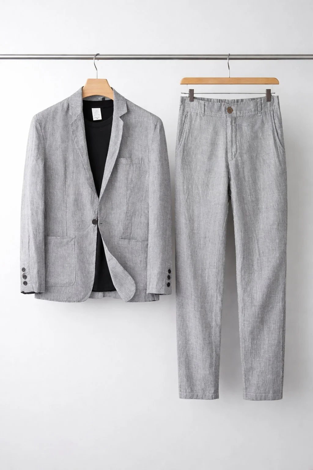 Men's suit set featuring a relaxed fit blazer and trousers made from breathable linen fabric, perfect for versatile formal and casual occasions. 8