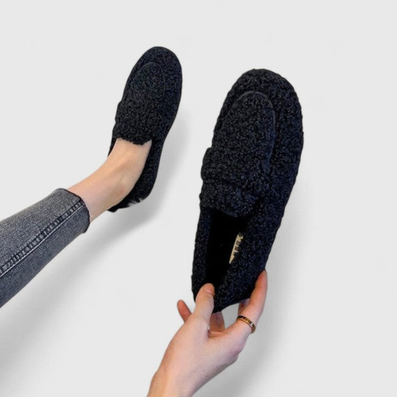 Plush slip-on slippers with cushioned sole in khaki, black, and beige, featuring an ultra-soft closed toe design for maximum comfort and relaxation 1