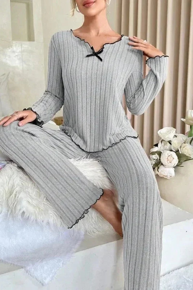 Ribbed knit women's pajama set featuring a relaxed full-length fit, lettuce edge detailing, and satin bow accent, available in rose pink, grey 6