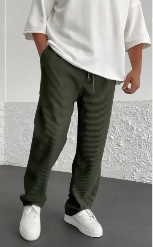 Ribbed stretch trousers with an elasticated waistband, designed for a casual everyday fit, made from soft fabric, available in khaki, black, 3