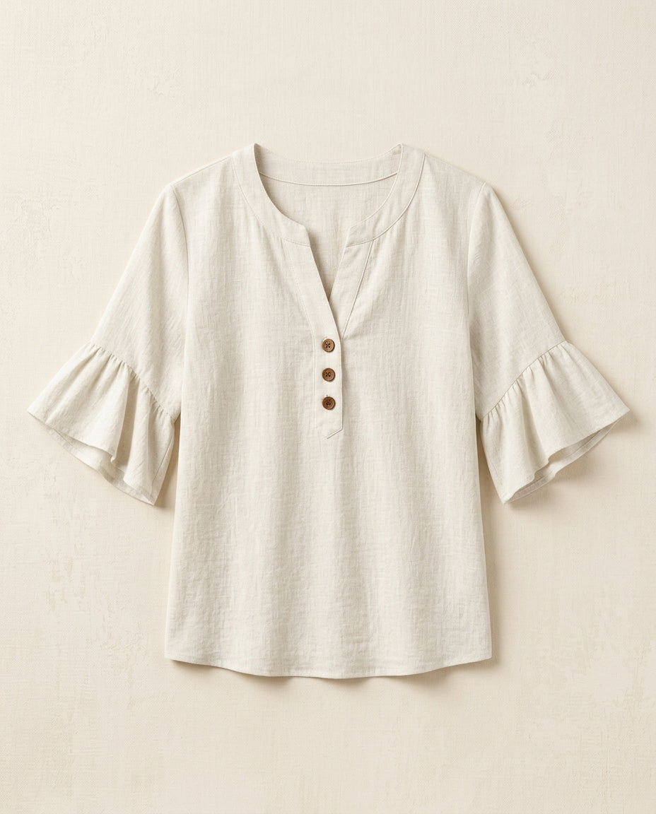 Ruffle blouse with V-neckline and decorative buttons, showcasing a feminine elegant design in soft fabric, perfect for stylish casual or formal wear. 6