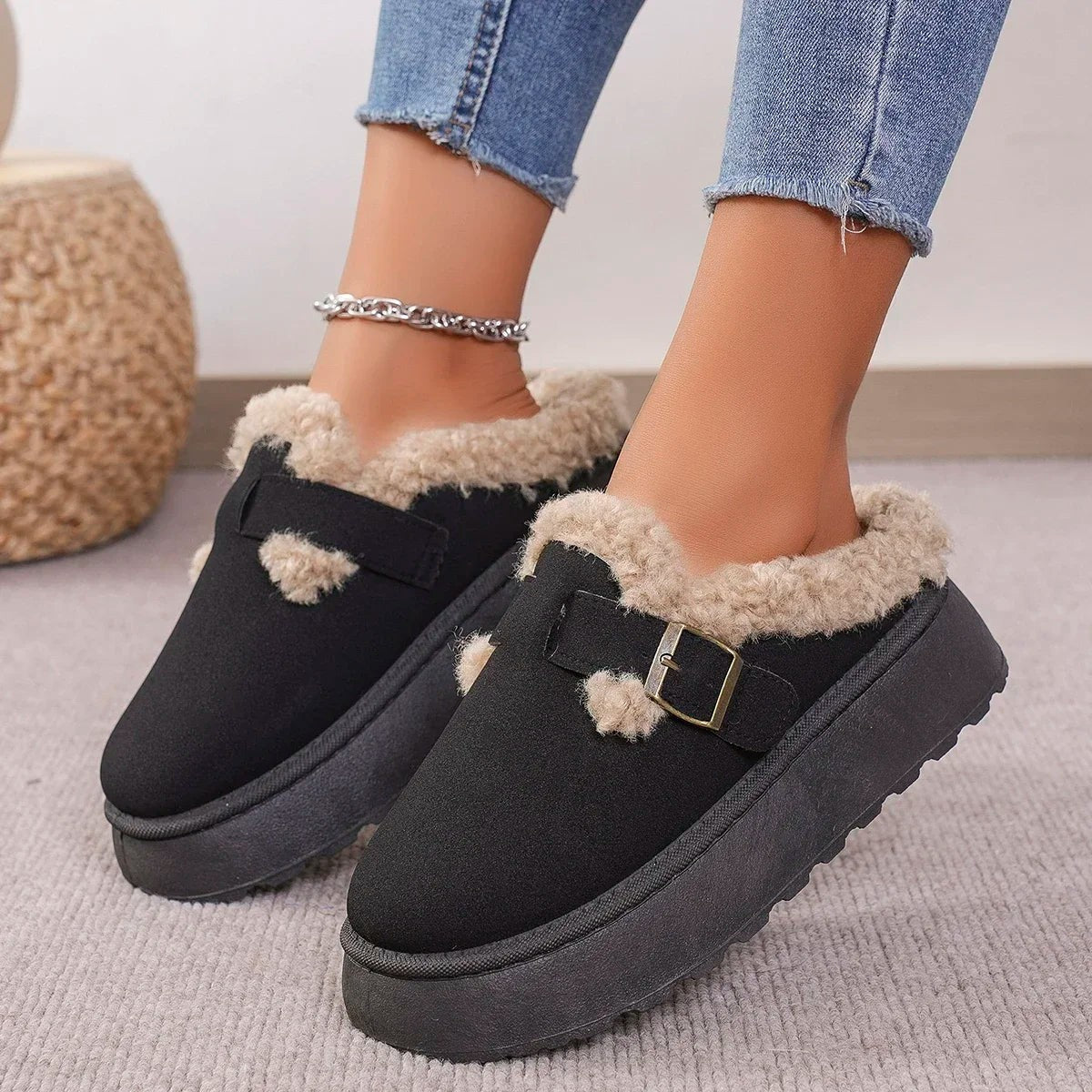 Suede slippers with plush lining and durable sole in brown, black, and white, offering slip-on comfort for indoor use. 3