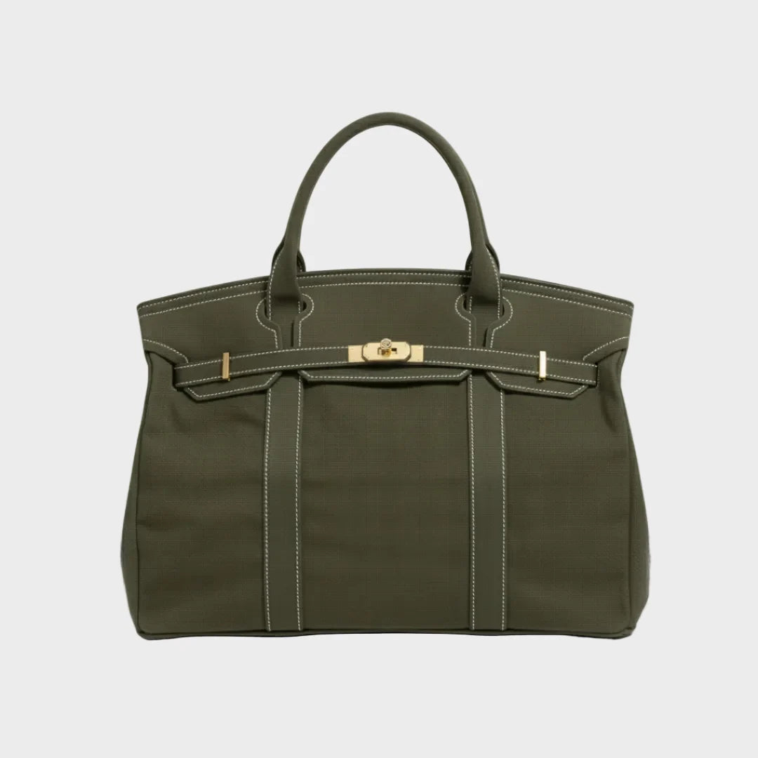 Vintage linen canvas tote bag featuring reinforced handles and a secure snap closure, designed for water resistance and ample space, perfect for everyday use. 7