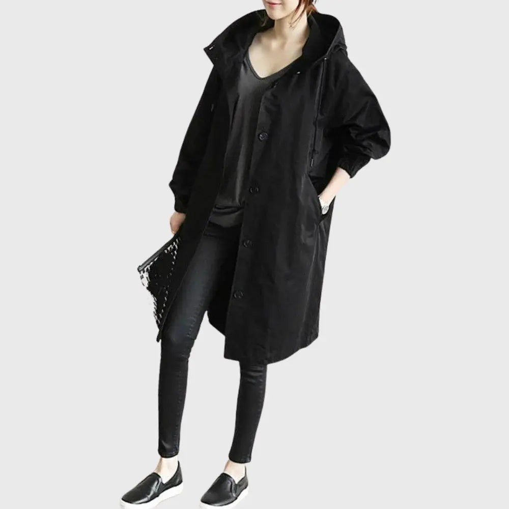 Waterproof trench coat for women featuring an adjustable belt, designed as a long raincoat in a timeless style for ultimate protection against the elements. 1