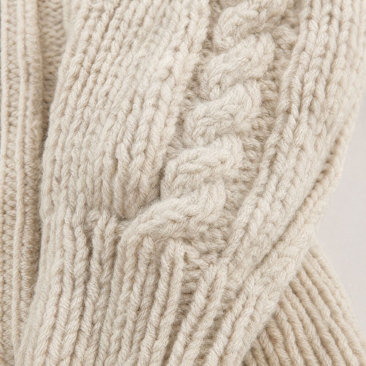 Women's chunky knit cardigan featuring an open front design, crafted from a soft wool-blend in oatmeal cream, designed for a relaxed fit. 2
