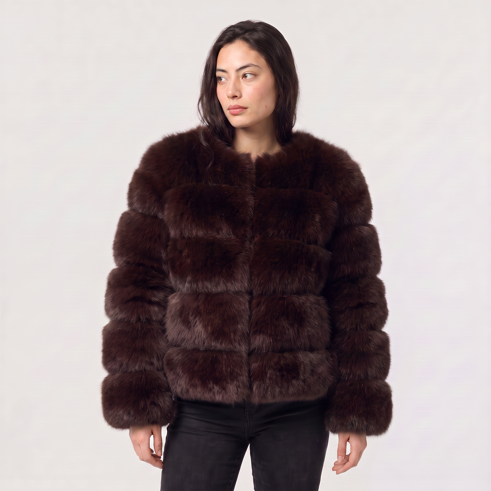 Women's faux fur jacket featuring a concealed fastening, designed for a relaxed fit and hip-length styling, perfect for fashionable layering in cool weather. 10