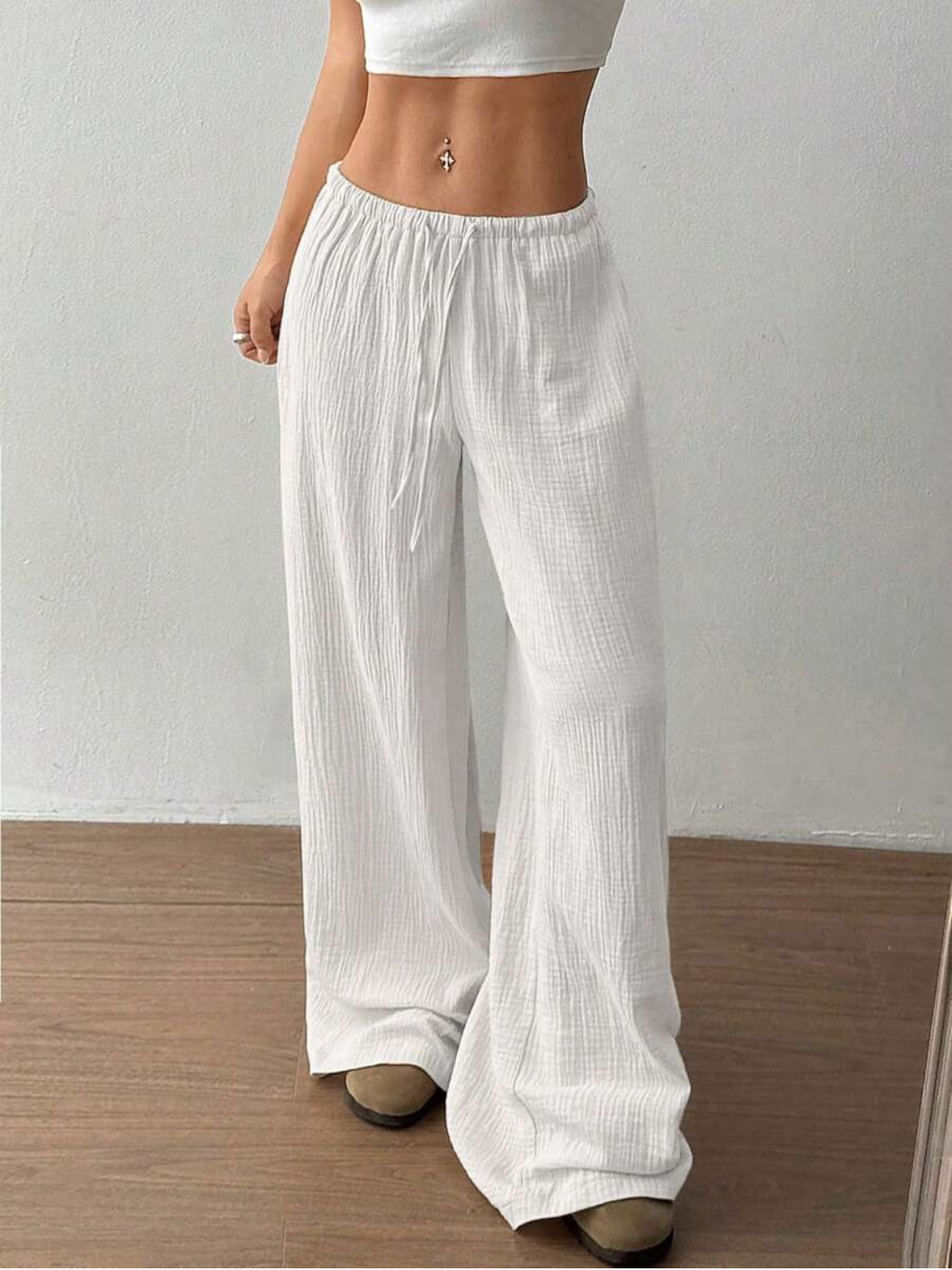 Women's linen wide leg pants featuring an adjustable drawstring, designed for casual lightweight comfort, perfect for summer outings. 5