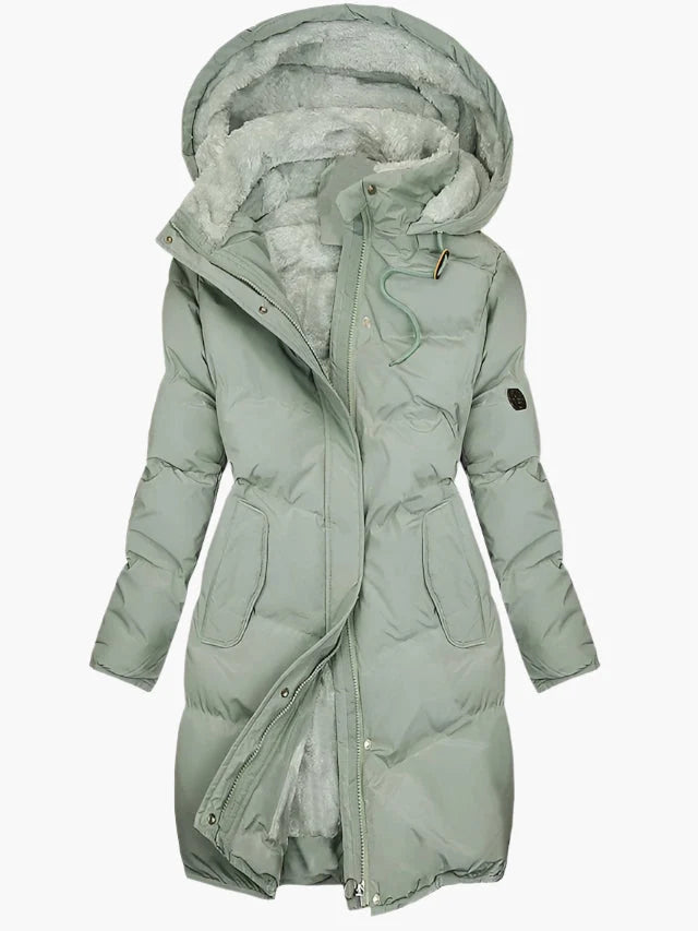 Women's long winter coat featuring a stylish faux fur hood and warming lining, designed for elegance and comfort in cold weather. 0