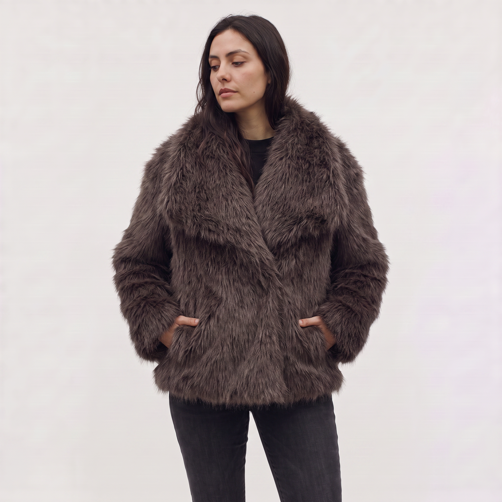 Women's longline faux fur coat featuring an oversized collar and a relaxed open-front design, perfect for stylish winter wear. 6