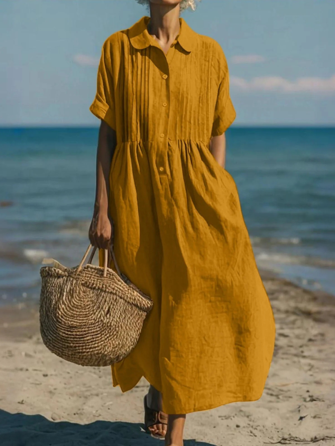 Women's maxi dress featuring a smocked waist and pintuck detailing, made from an elegant linen blend, perfect for summer occasions. 4