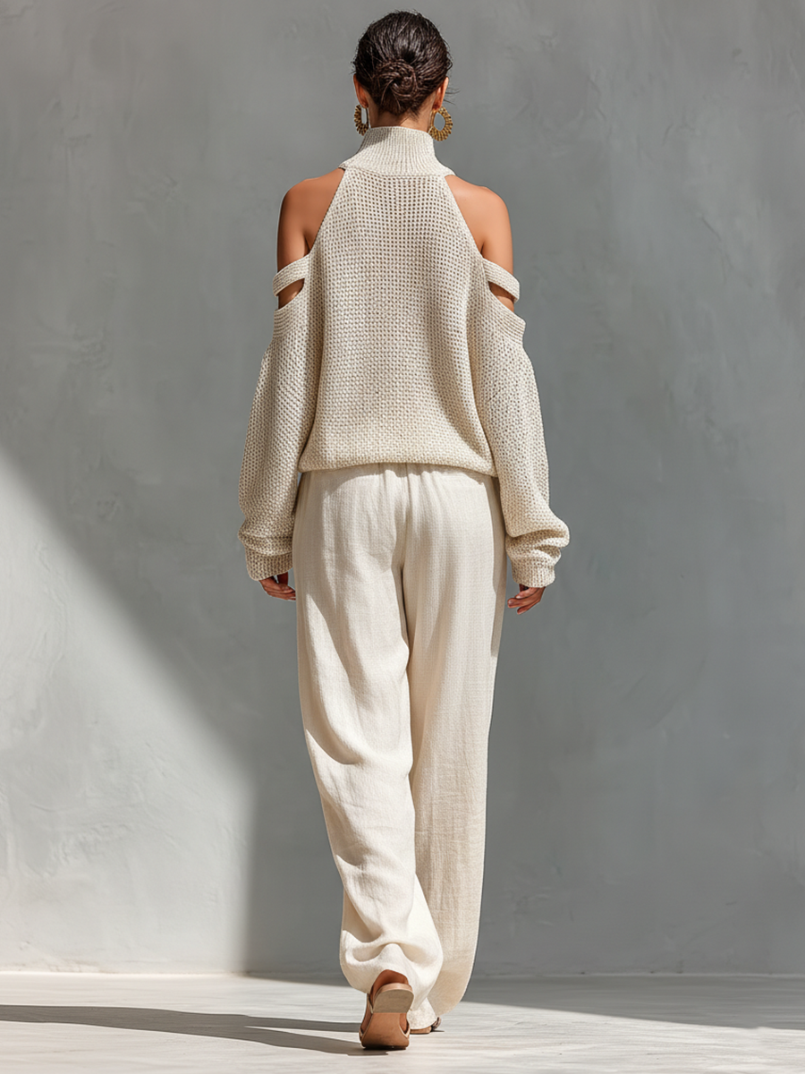 Women's outfit set featuring a beige cold-shoulder knit turtleneck top paired with wide-leg pants, showcasing a modern and comfortable style perfect for casual 1