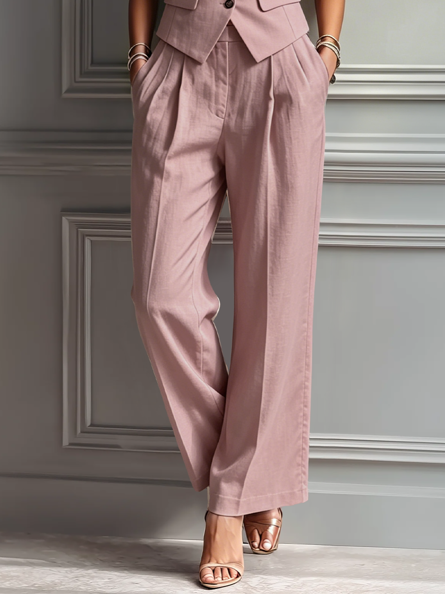 Women's blush pink linen set featuring a sleeveless vest and wide-leg pants, designed for a relaxed fit and comfortable style. 3