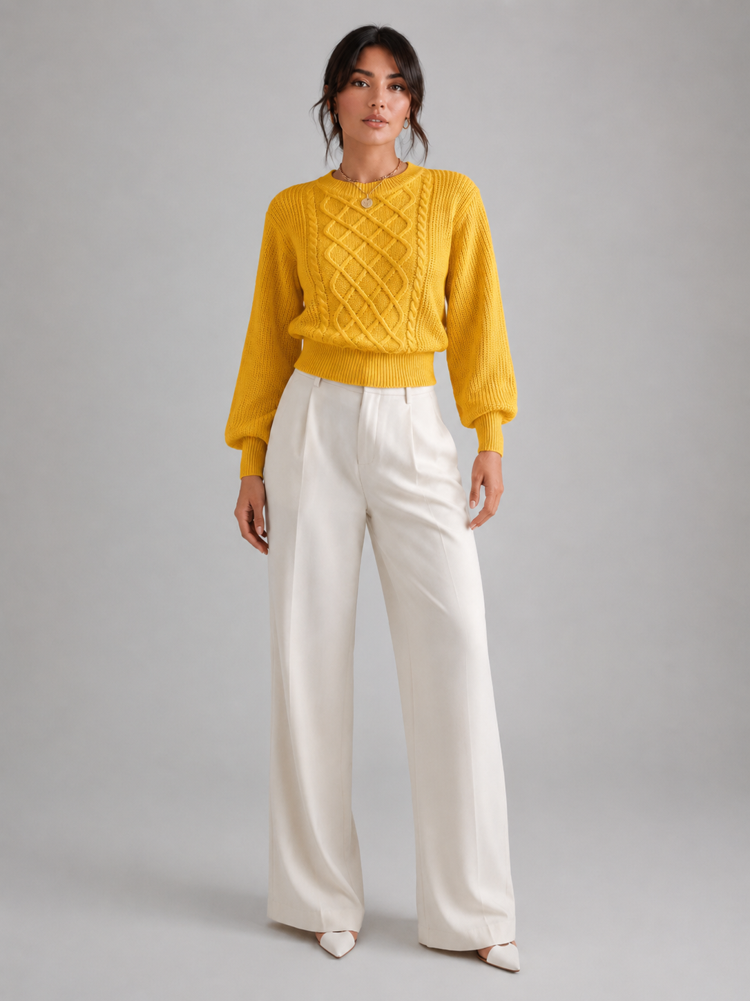 Women's sweater featuring stylish lantern sleeves, a cozy cable knit design, and a comfortable crew neck, available in five vibrant colors. 3