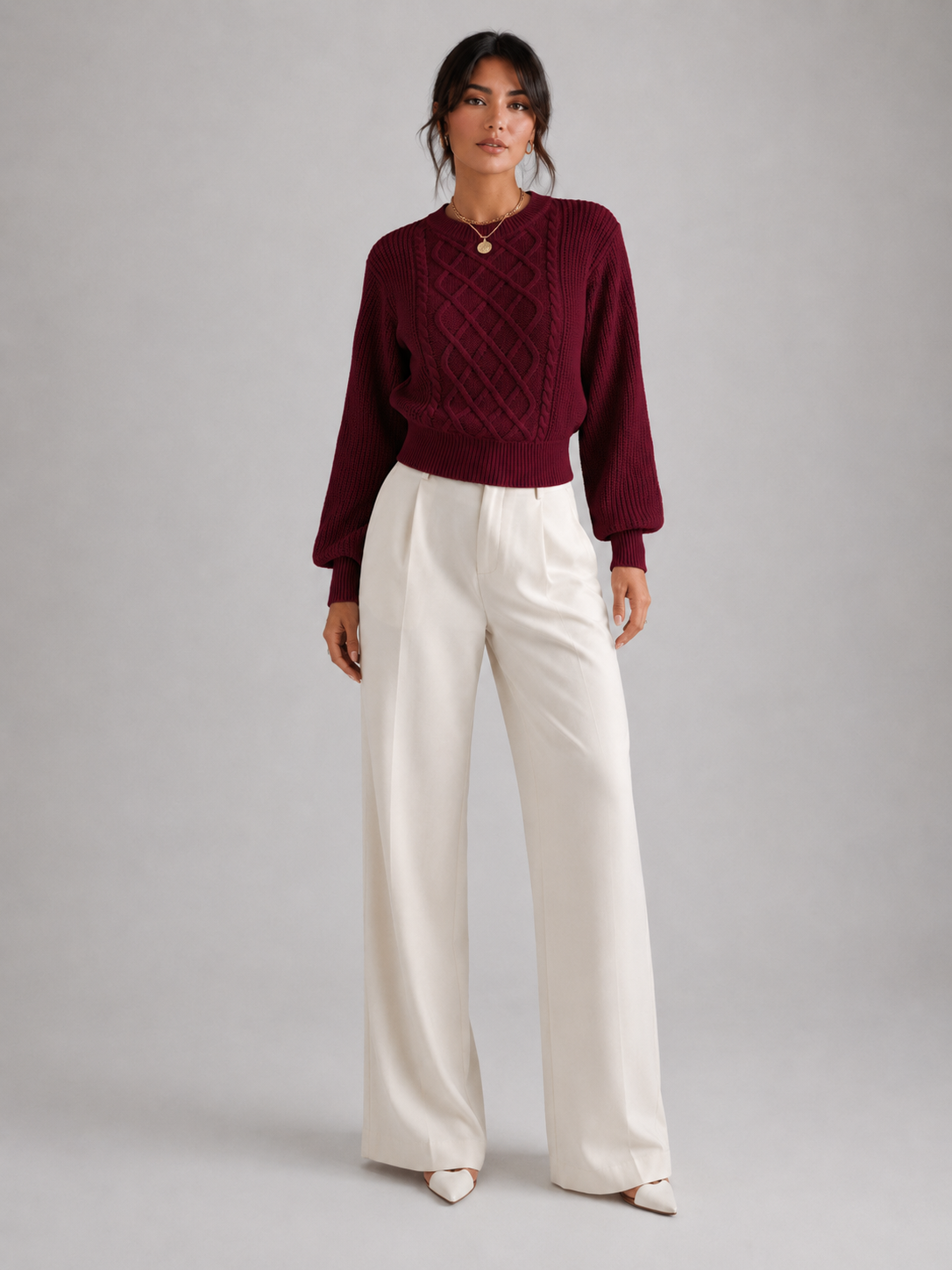 Women's sweater featuring stylish lantern sleeves, a cozy cable knit design, and a comfortable crew neck, available in five vibrant colors. 4
