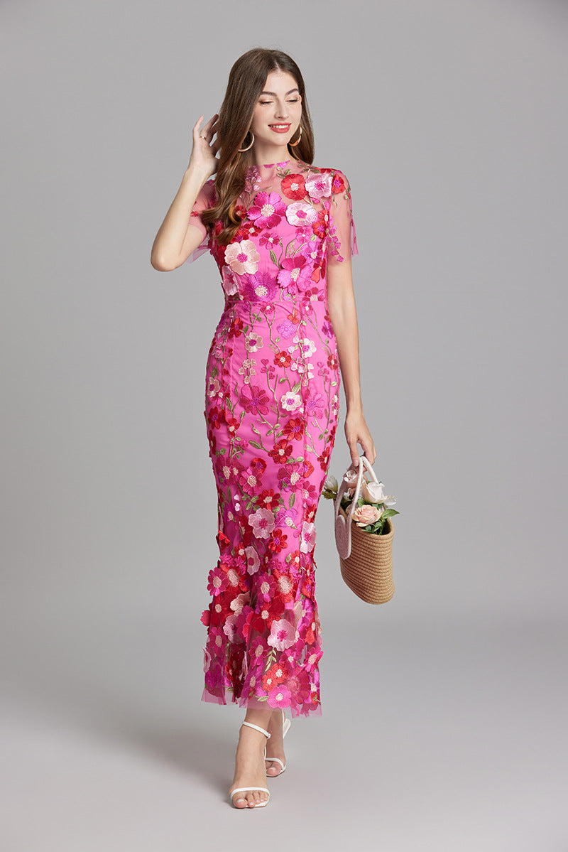 Womens elegant midi length dress featuring floral embroidery and a high neckline, perfect for summer wedding guests. 10
