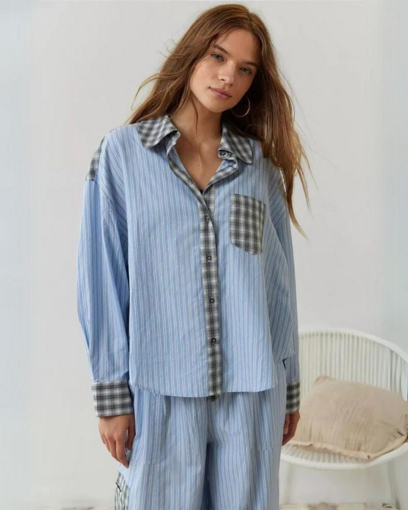 Womens pyjamas set featuring a relaxed fit, made from soft breathable fabric, with full-length trousers available in pink or blue. 6