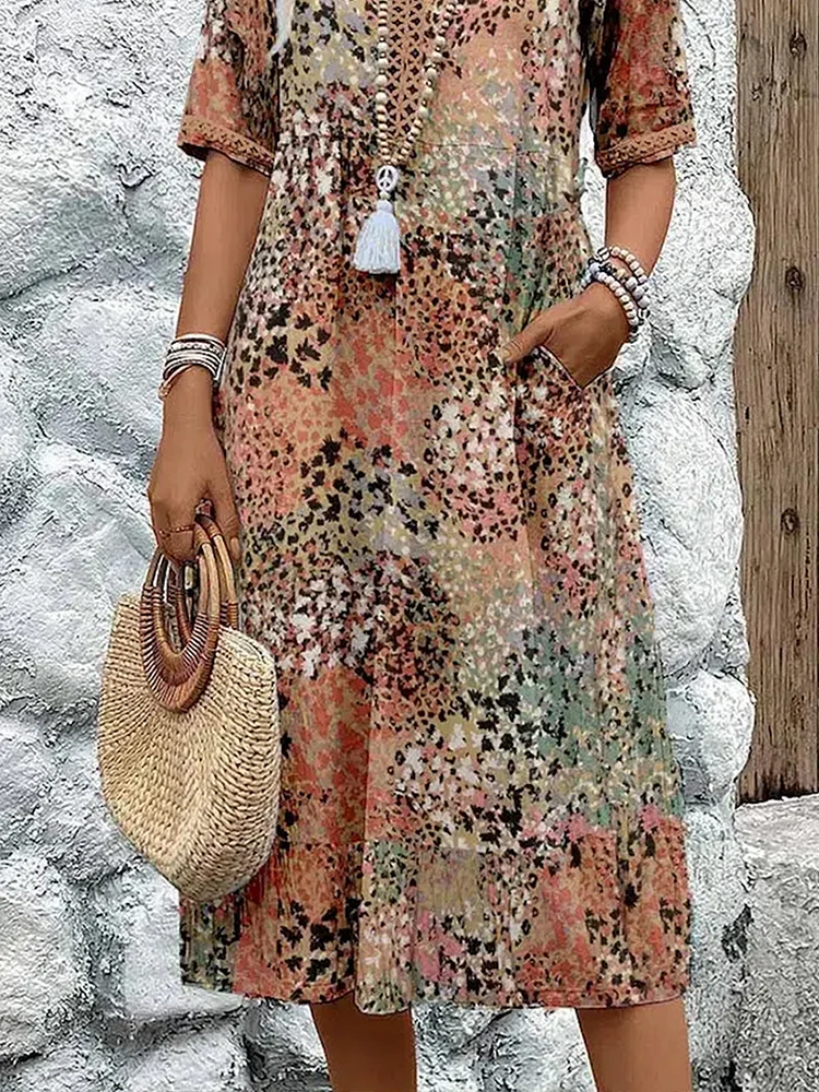 Womens summer dress featuring a V-neck design and vibrant floral pattern, knee-high length, comfortable fit, and plus sizes available for a stylish and flattering 6