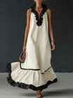 Elegant A-Line Maxi Dress with Ruffle Trim and V-Neck, featuring a sleeveless design in blue and off-white, perfect for women's formal and 2