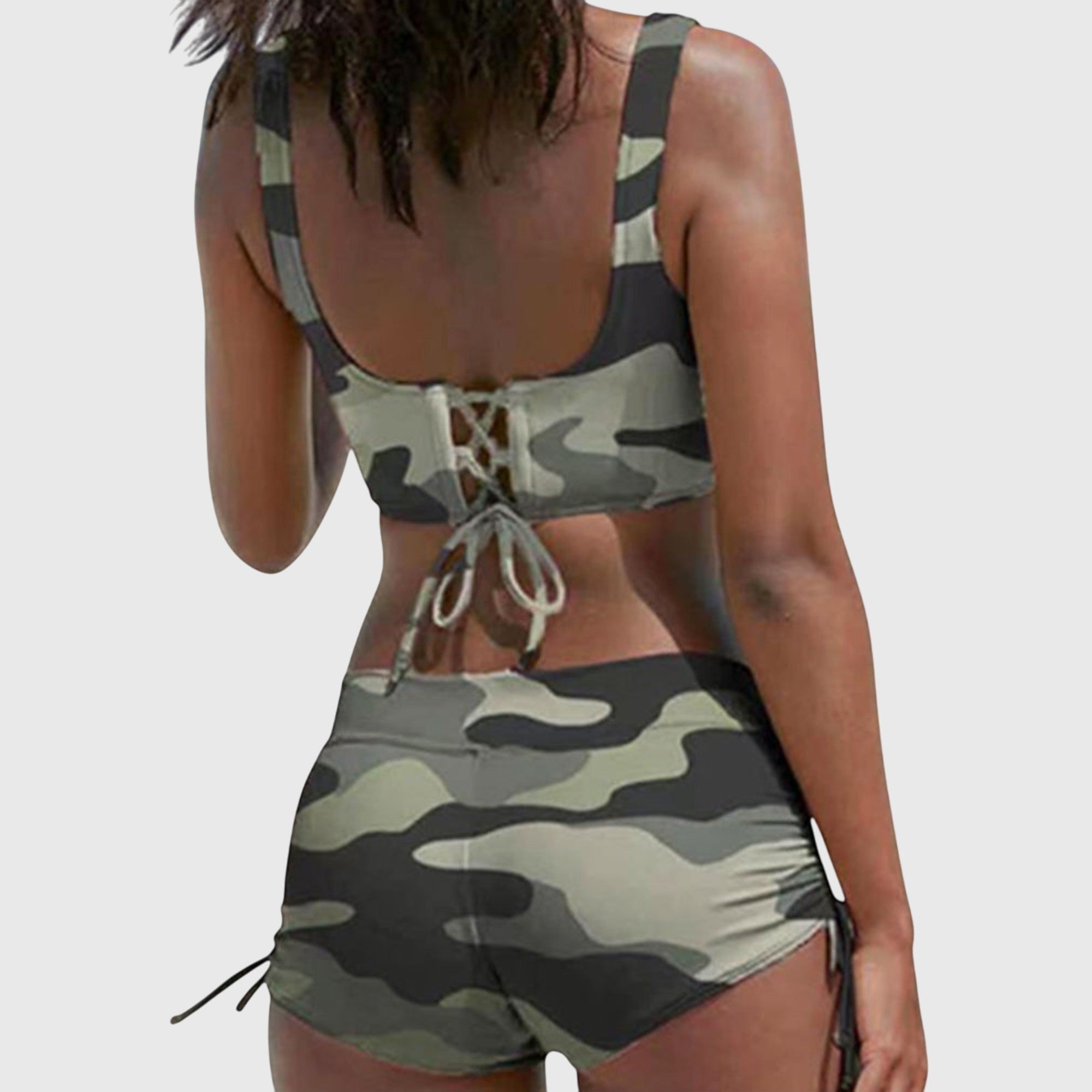 Bikini swimsuit set featuring a trendy camouflage pattern, designed as a sporty two-piece swimwear for women, perfect for beach and pool activities. 1