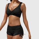 Bikini swimsuit set featuring a trendy camouflage pattern, designed as a sporty two-piece swimwear for women, perfect for beach and pool activities. 5